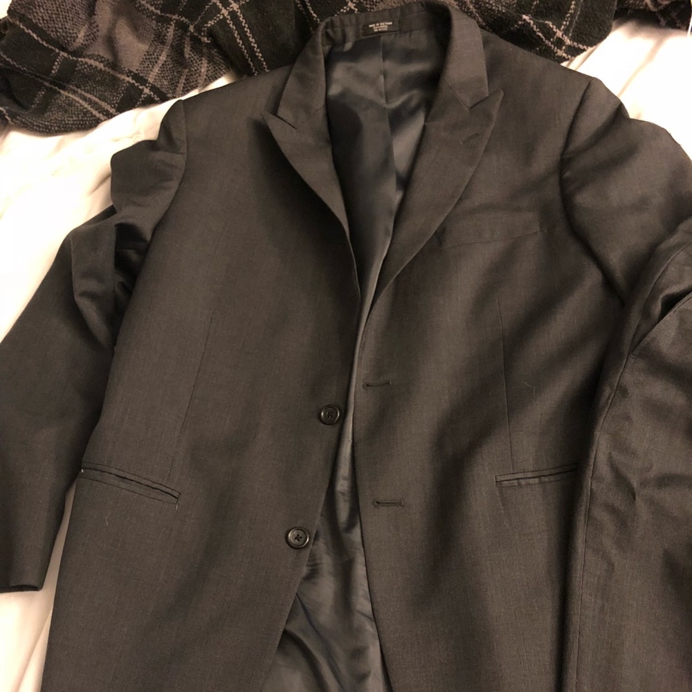 Full charcoal grey suit.